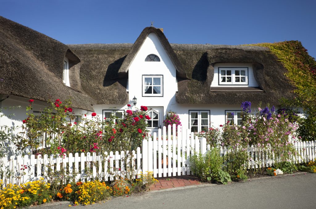 cottage with thatched straw roof